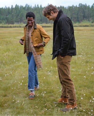 A man and woman outside wearing Field Coats.