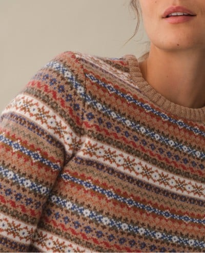 Close-up of woman wearing a Signature Camp Merino Wool Sweater.