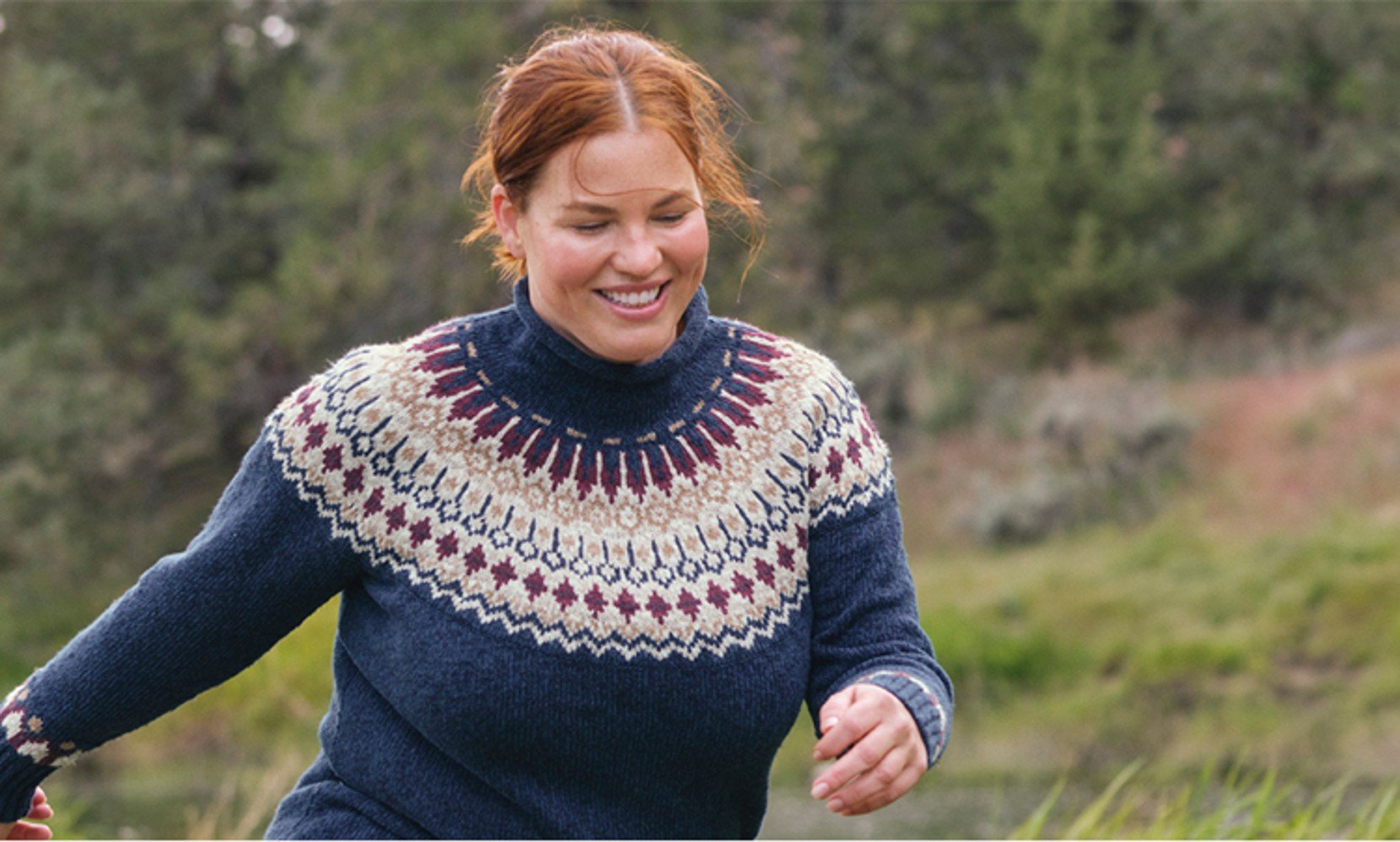 Close-up of woman outside wearing a Cotton Ragg Sweater.