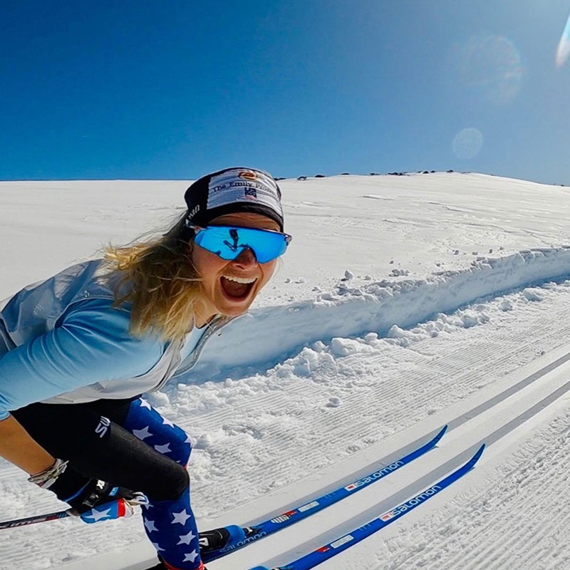 Jessie smiles for the camera as she cross-country skis by.