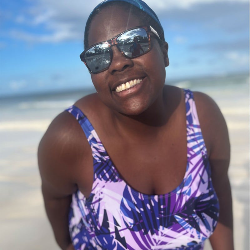 Close-up of L.L.Bean Ambassador Mirna Valerio in a on the beach.