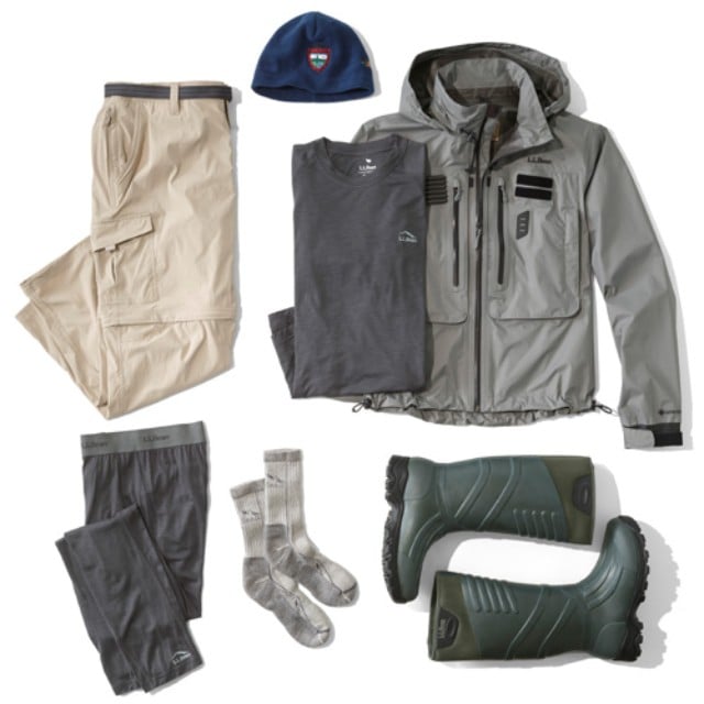 A laydown of clothing needed for hiking in cold weather.