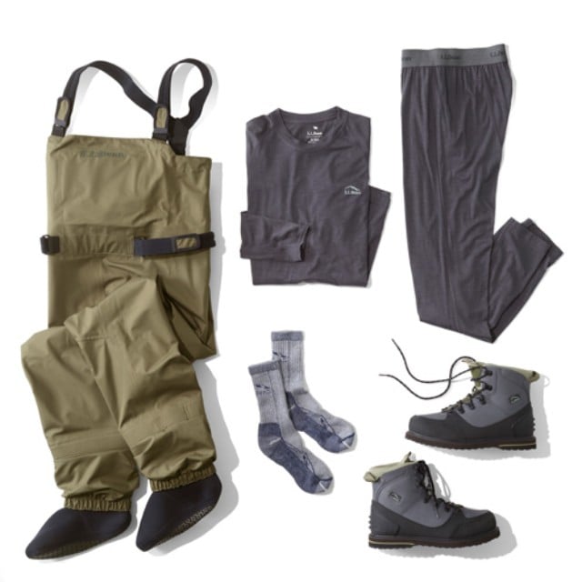 A laydown of clothing needed for fishing in waders.