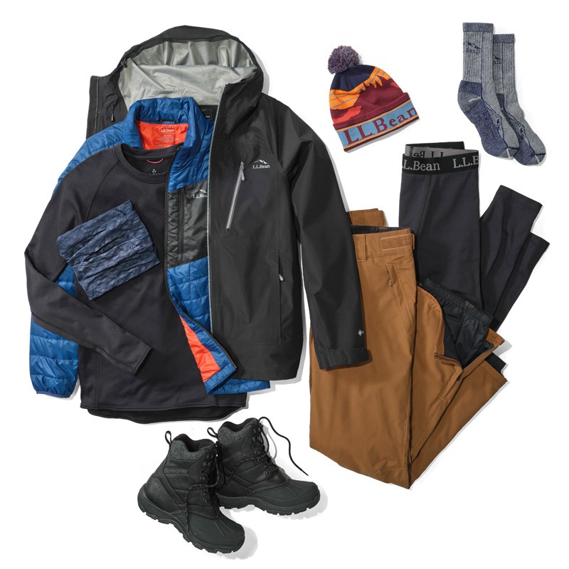 A laydown of clothing needed for fishing in cold weather.