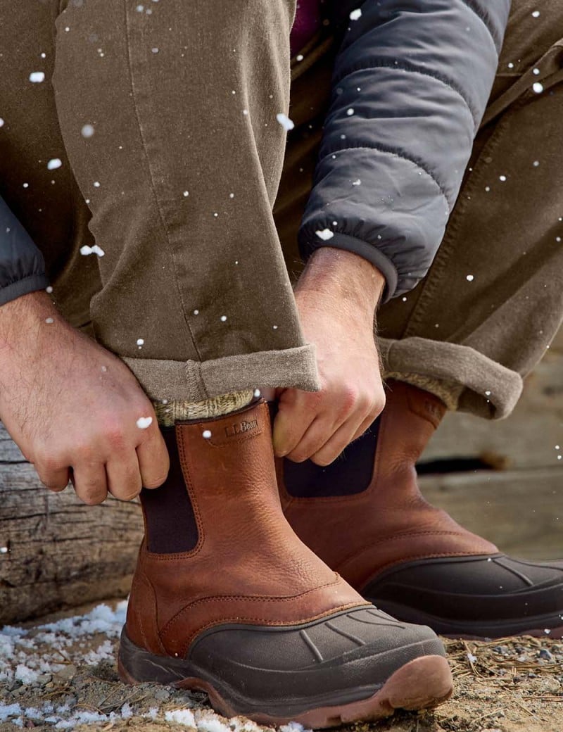 Close-up of boots in the snow.