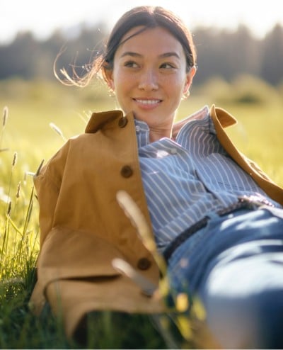 A woman wearing a Men's Field Coat